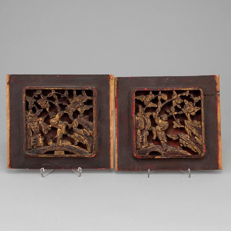 Two Chinese wooden carved painted panels, early 20th century.