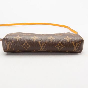 A Louis Vuitton Pallas clutch.