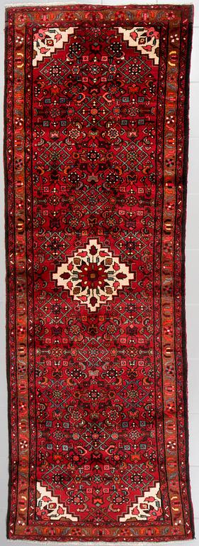 A Hosseinabad runner, 300 x 98 cm.