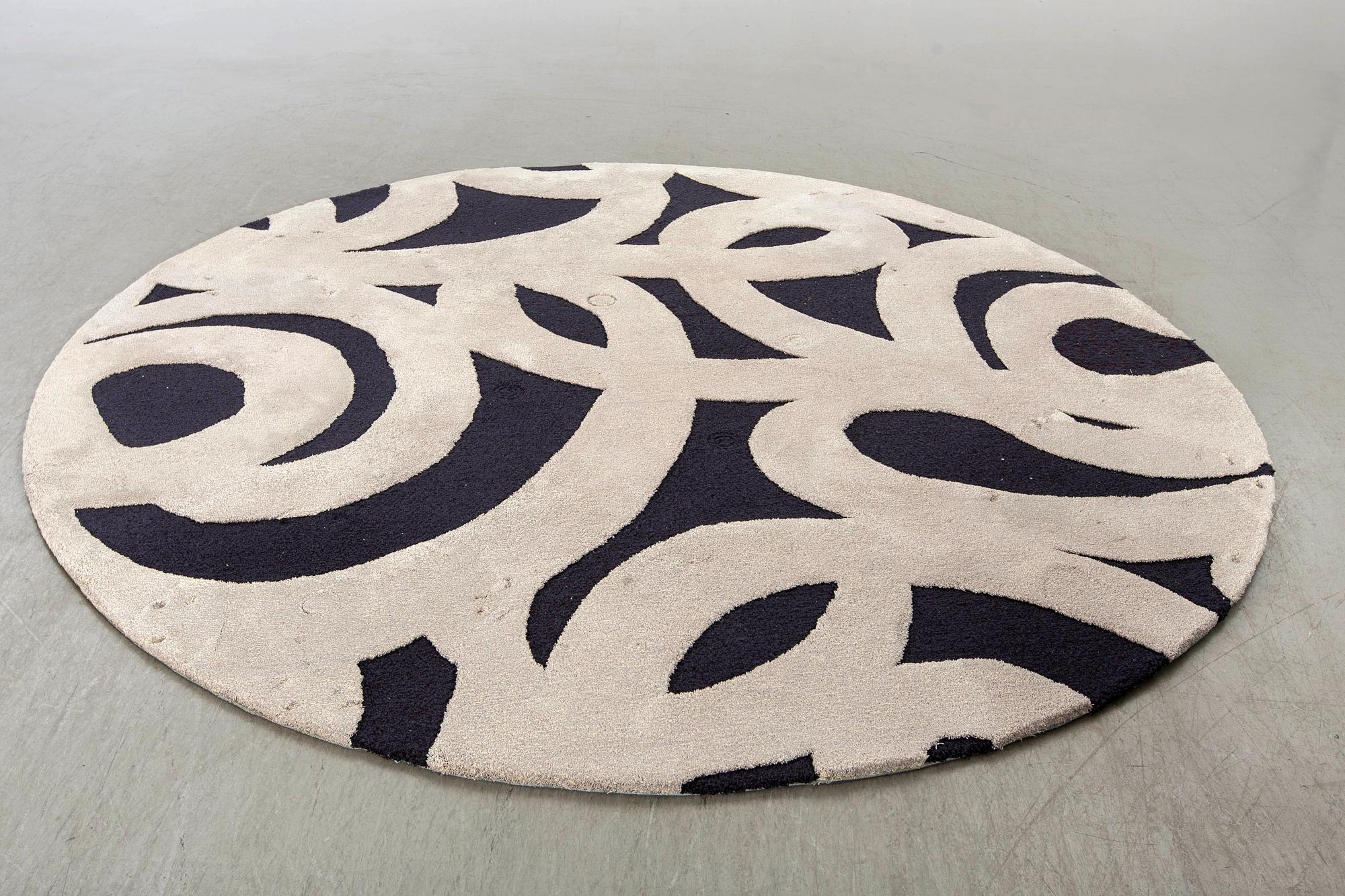 A RUG BY ALMEDAHLS MODELL "LACE", DIAMETER 240 CM.