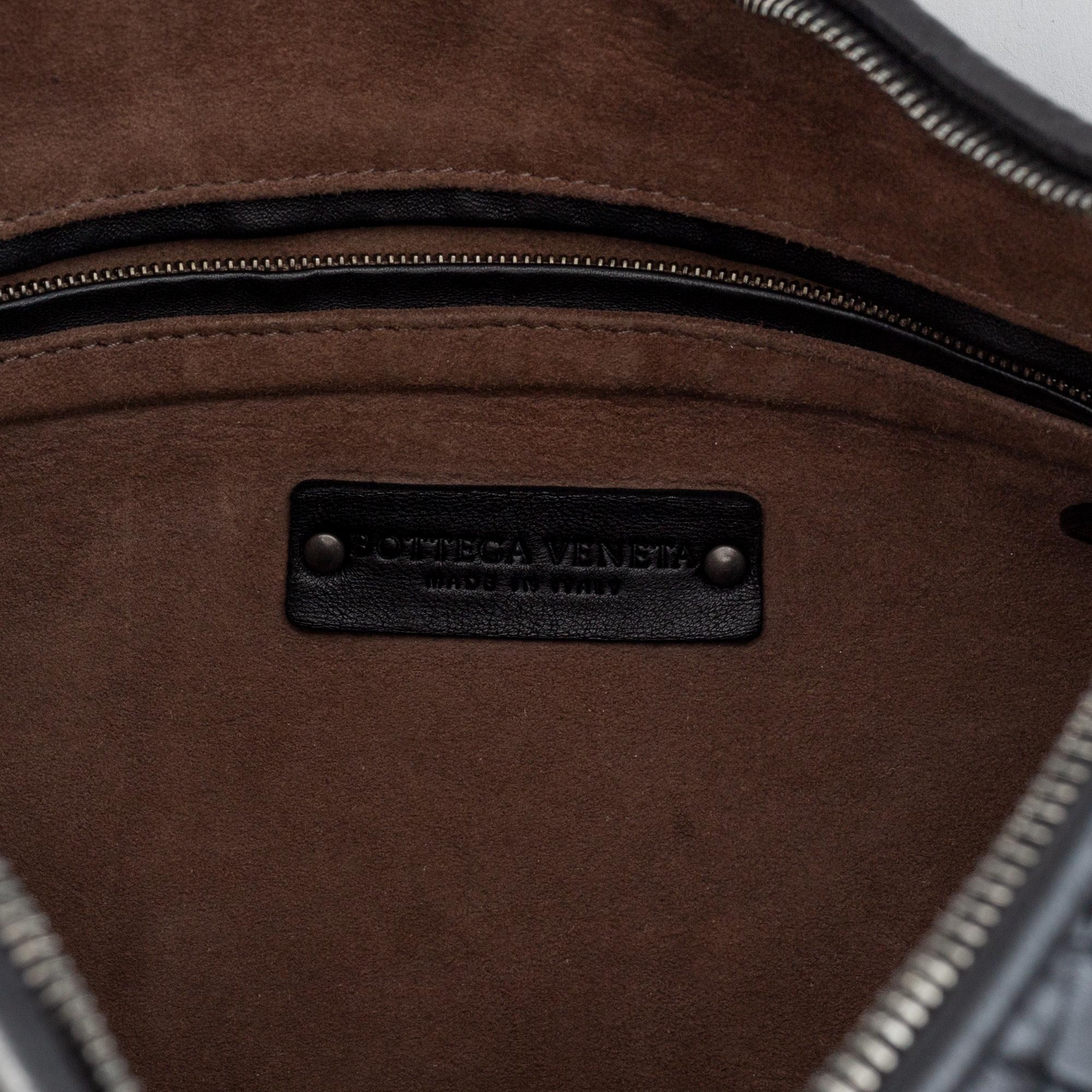 Bottega Veneta, black leather bag.