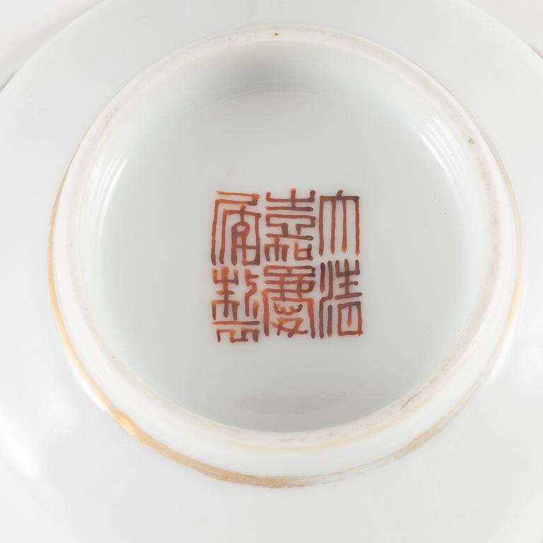 A powder blue and famille verte jar and two famille rose cups, Qing dynasty, 19th Century.