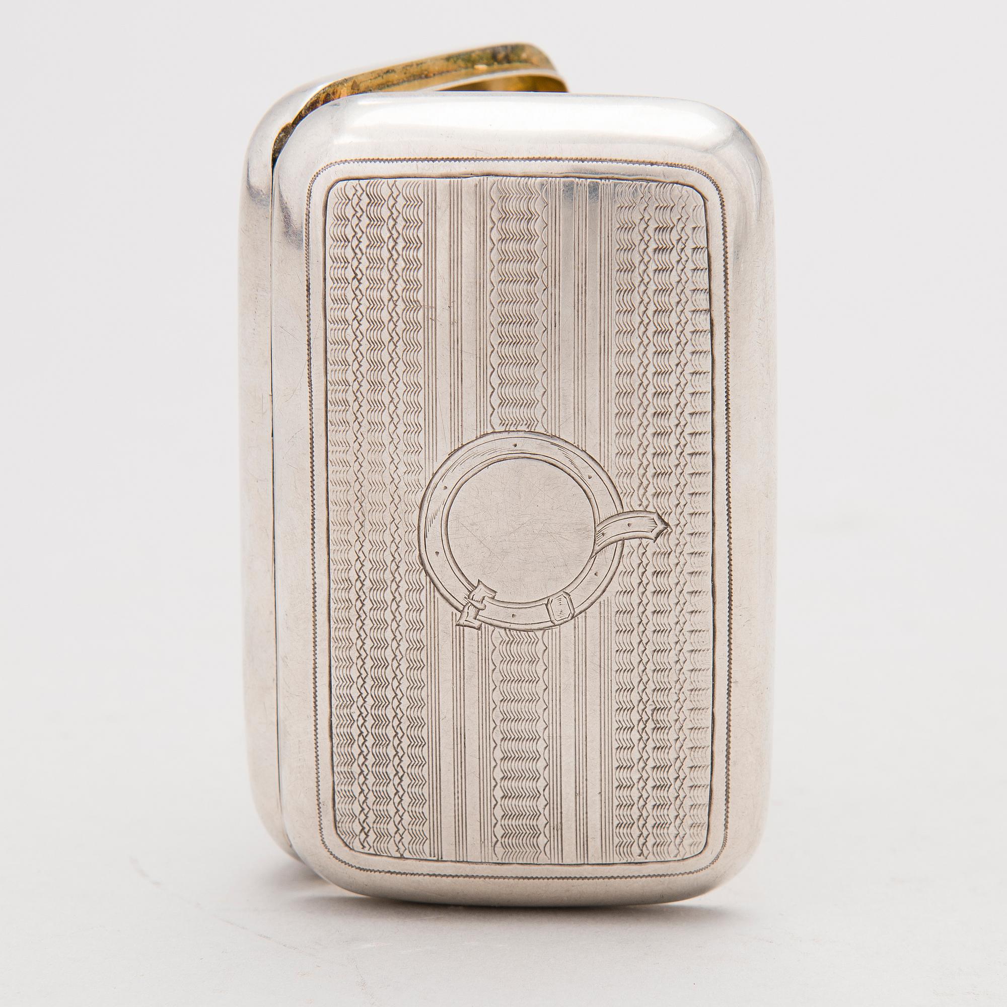 A Russian silver cigarette case, mark of OE, assay master Vasily Aleksandrovich Petrov, Moscow (1883-1893).
