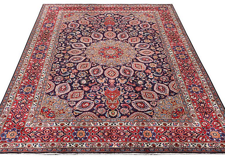 A Meshed carpet, c. 352 x 253 cm.