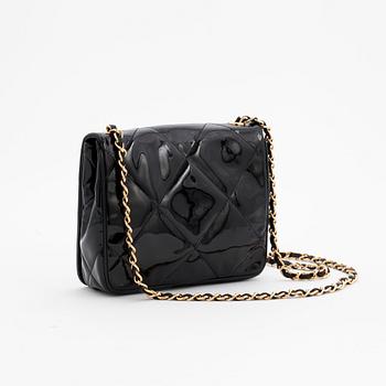 CHANEL, a black patent leather shoulder back.