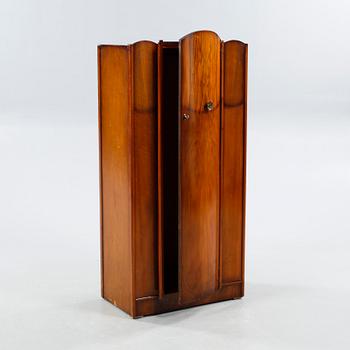 A wardrobe from Raven Furniture K & T, first half of the 20th century.