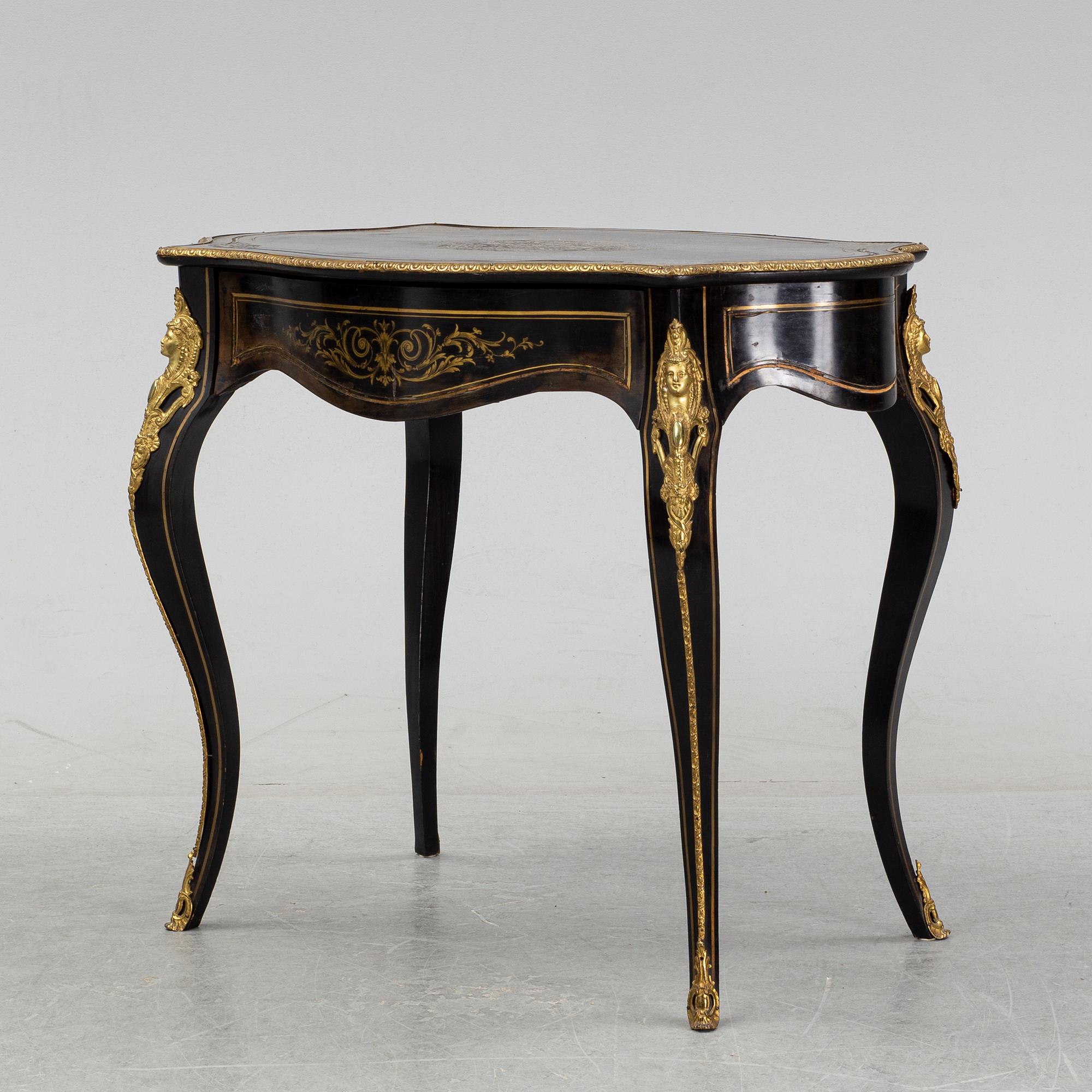 A Louis XV style table, early 20th Century.