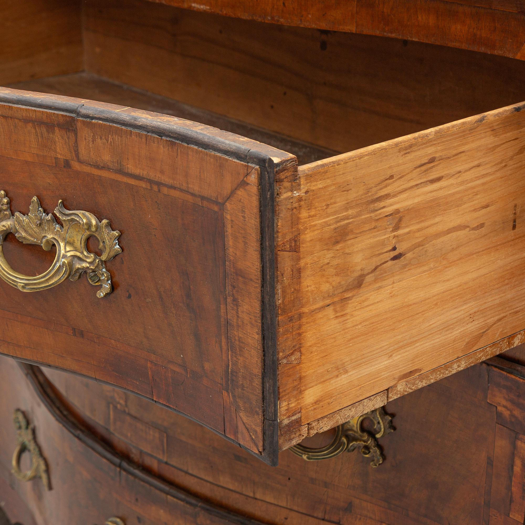 A late Baroque chest of drawers, mid-18th Century.