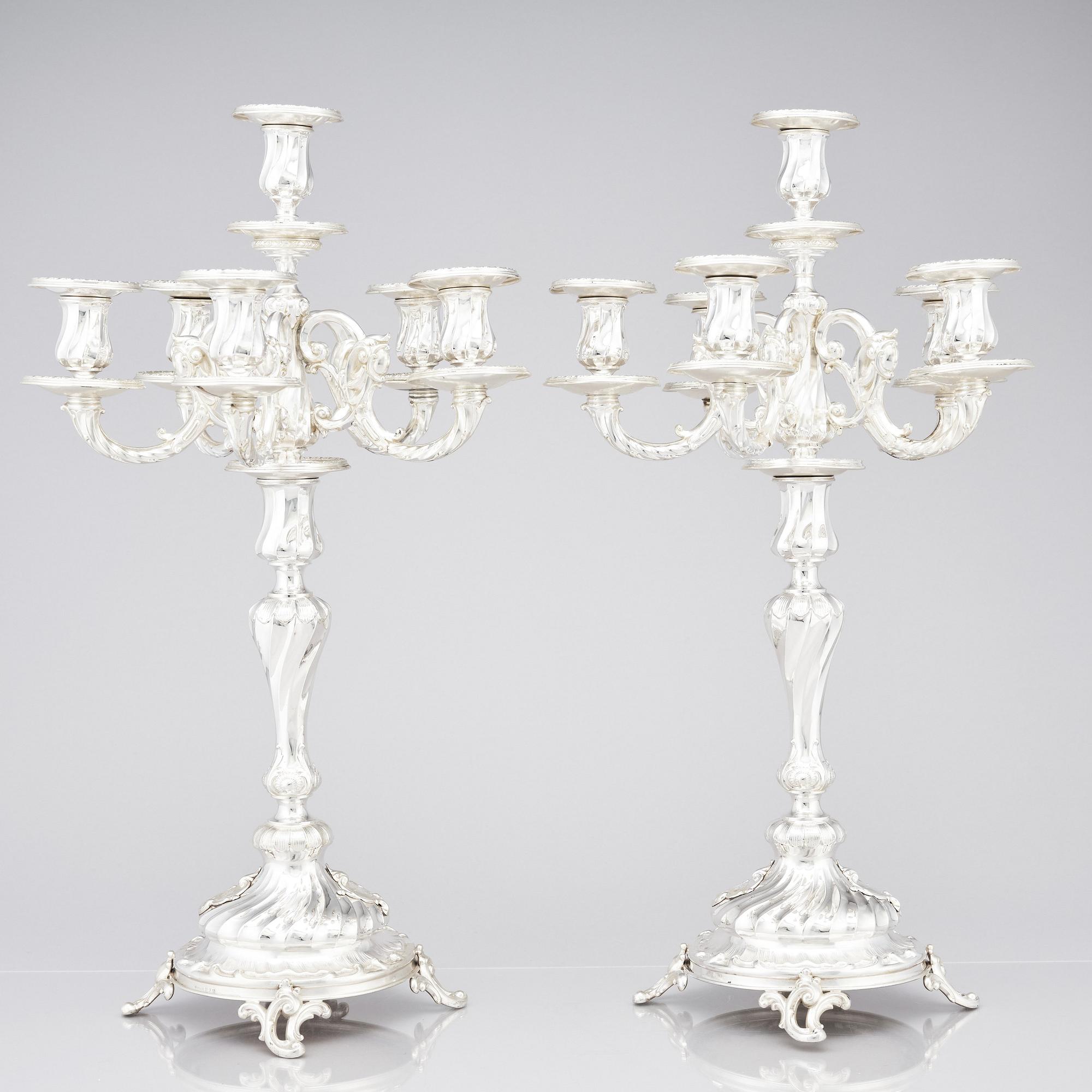 A pair of Swedish silver candelabra, mark of Gustaf Möllenborg (Carl Teodor Feron), Stockholm 1896.
