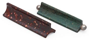 685. Two Swedish porphyry 19th century knives rests.