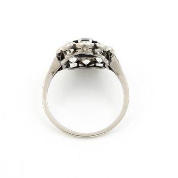 Carmose ring in platinum with sapphire and old-cut diamonds.
