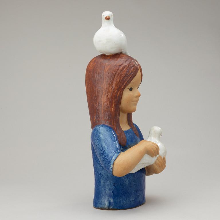 A Lisa Larson Larson stoneware sculpture of a girl with doves, Gustavsberg.