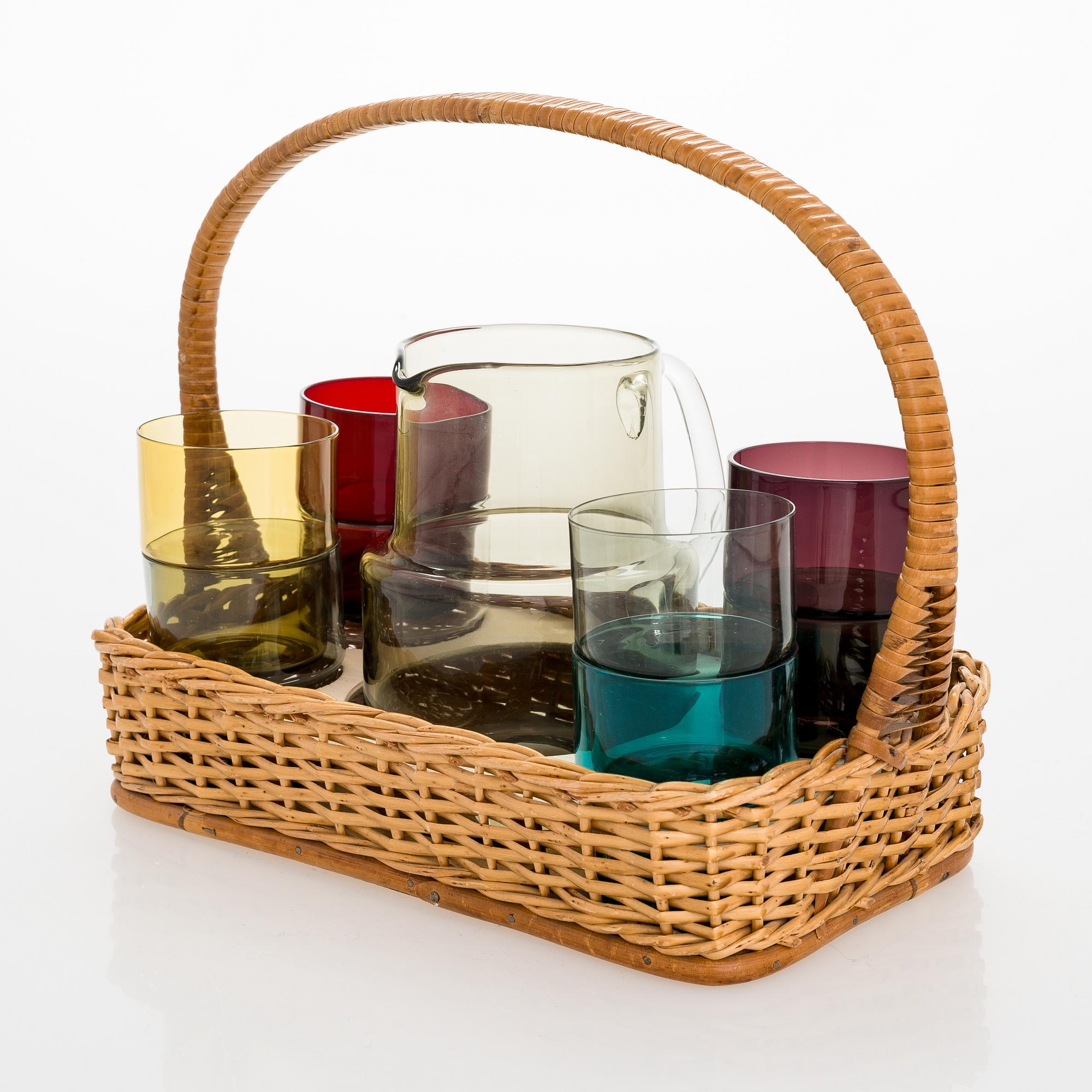 Saara Hopea, A glass pitcher and six glasses in rattan basket, for Nuutajärvi. Designed year 1952.