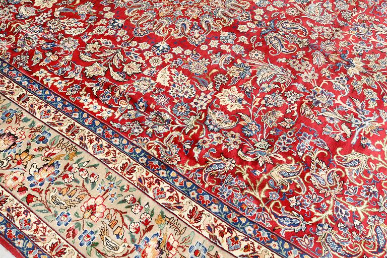 A carpet Yazd, c. 394 x 299 cm.