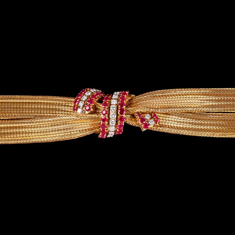 A gold, ruby and diamond bracelet, 1950's.