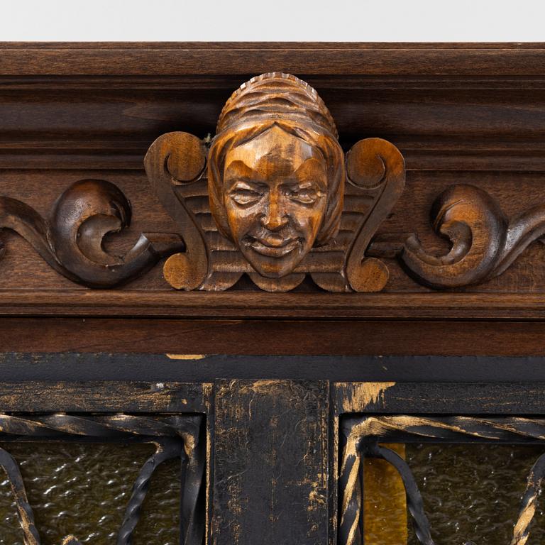 A Baroque style drinks cabinet, first half of the 20th Century.