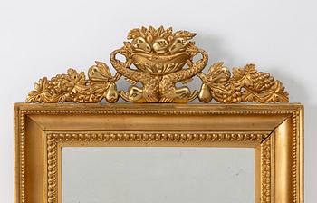 A pair of Late Empire gilded mirror sconces for two candles, Gothenburg, 1830s-40s.