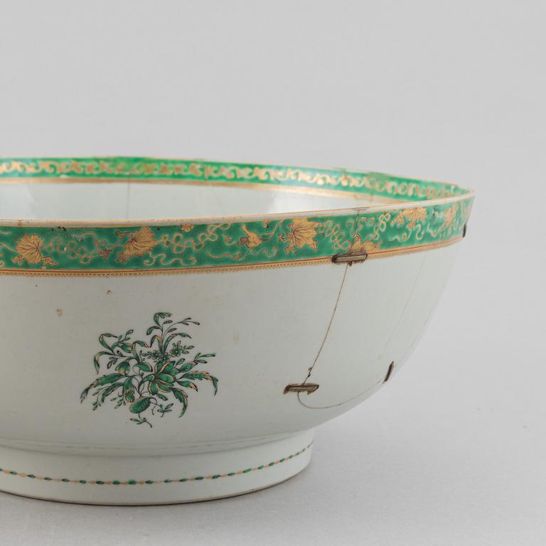 Two large famille rose and gilt punch bowls, Qing dynasty, 18th century.