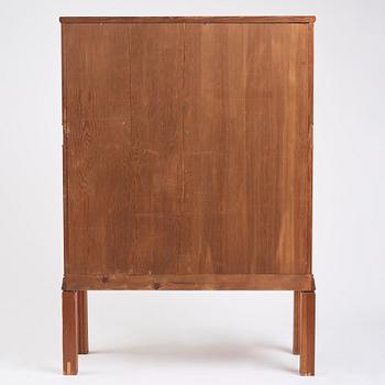 A Swedish Modern stained pine cabinet, 1940s.