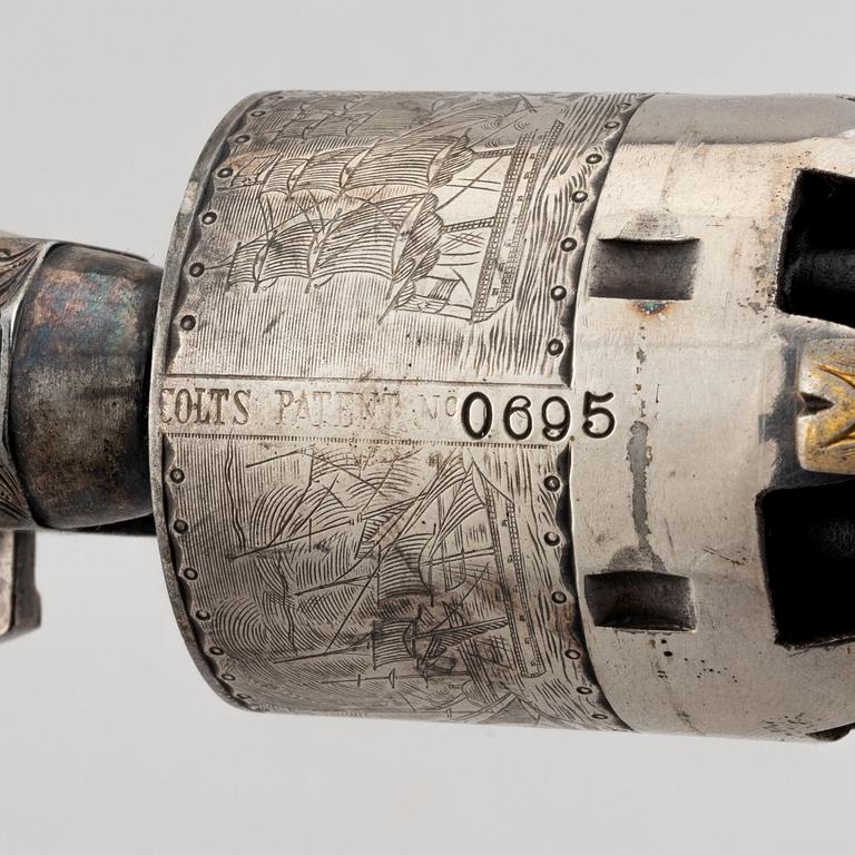 A percussion revolver, Colt 1851 Navy, in case, from the year 1863.