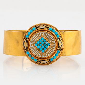 1045. An 18K gold and enamel bangle set with turquoises.