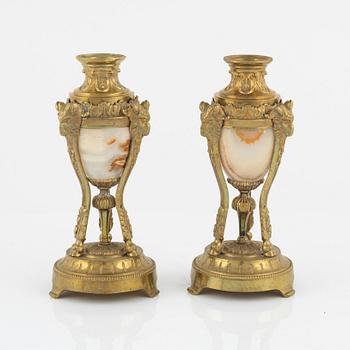 A pair of Napoleon III Louis XVI-style gilt-bronze cassolettes, later part of the 19th Century.