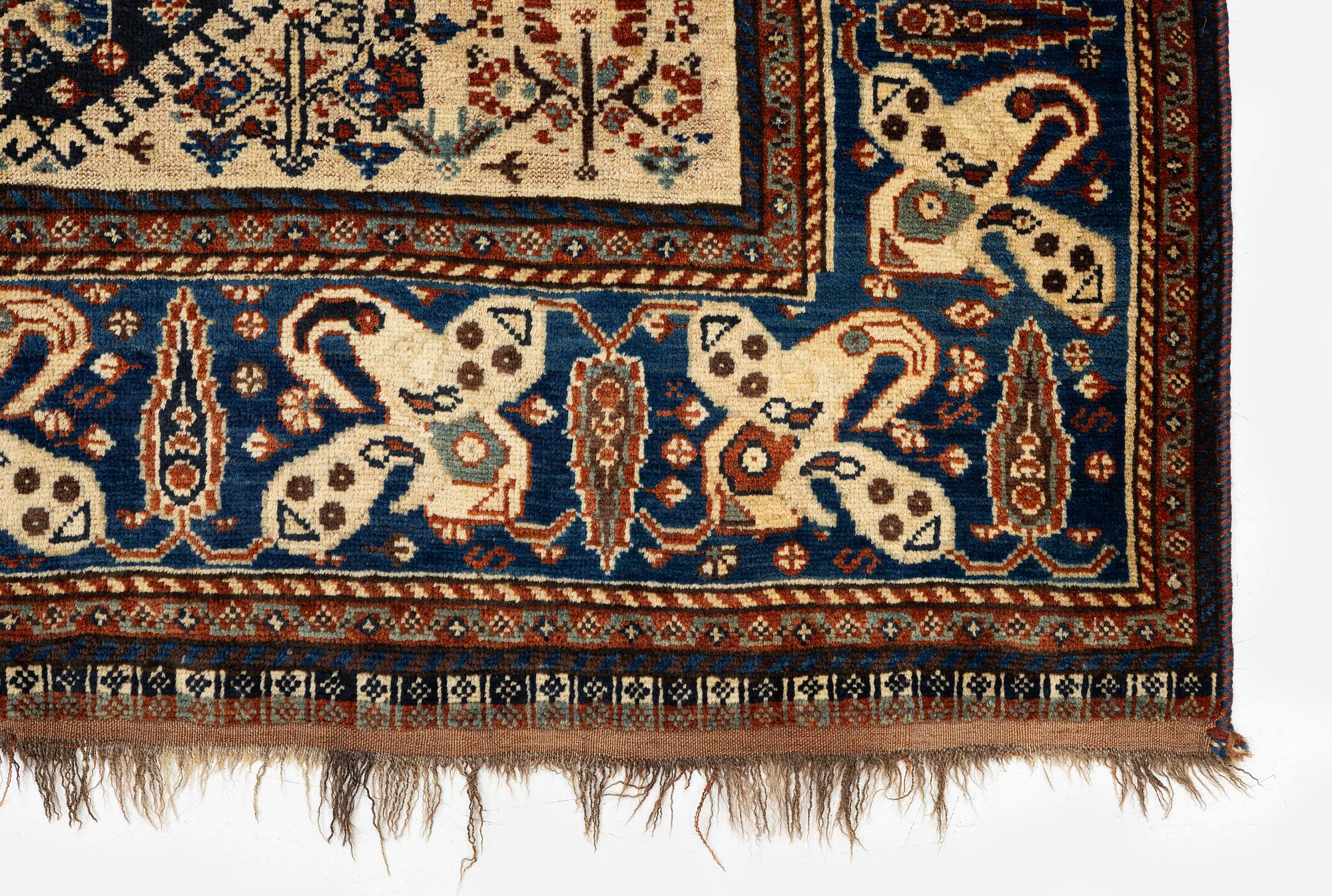 An antique Qashqai rug, South Persia, c. 189 x 142 cm.