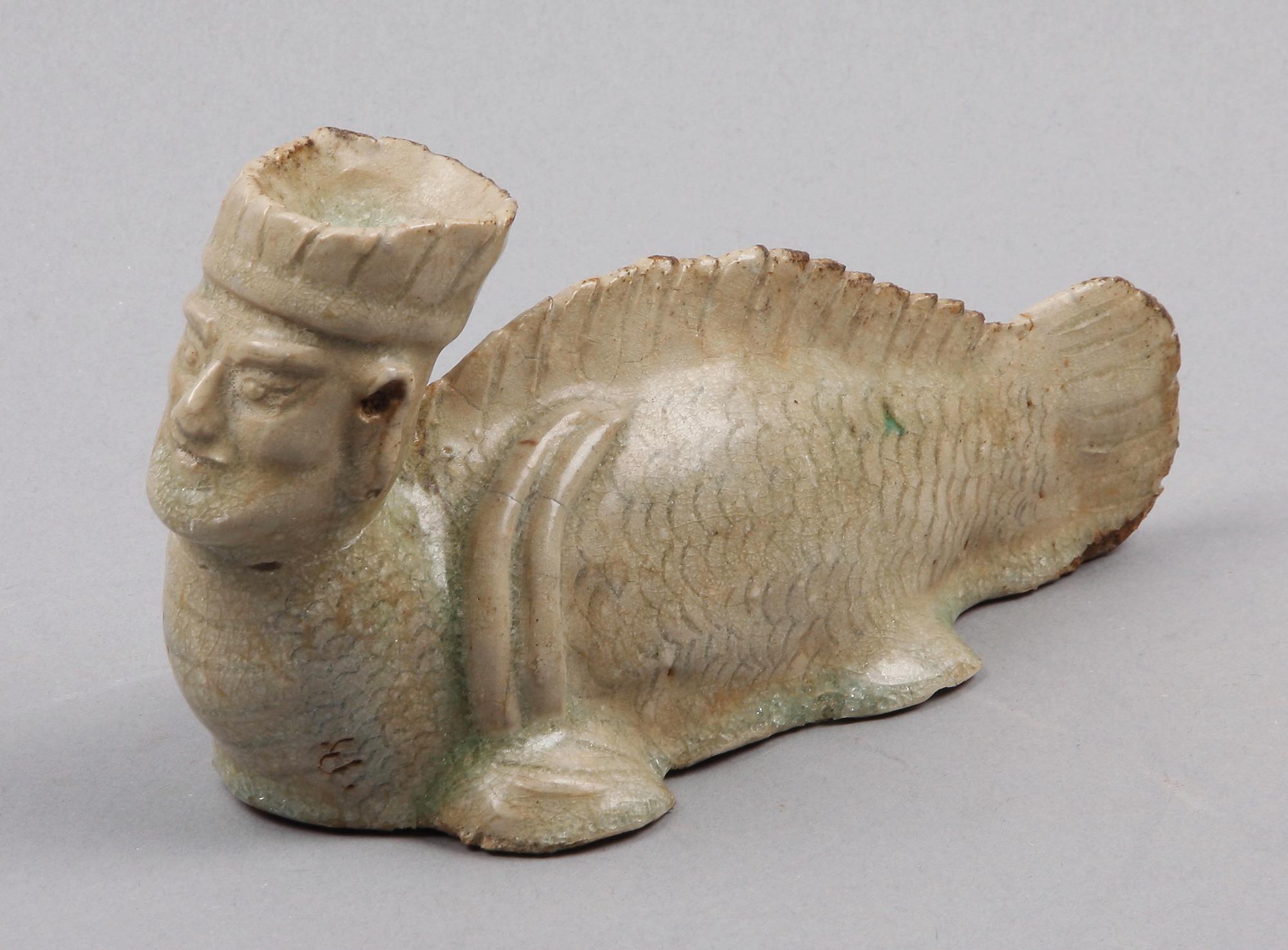 FIGURIN, lergods, orientalisk.