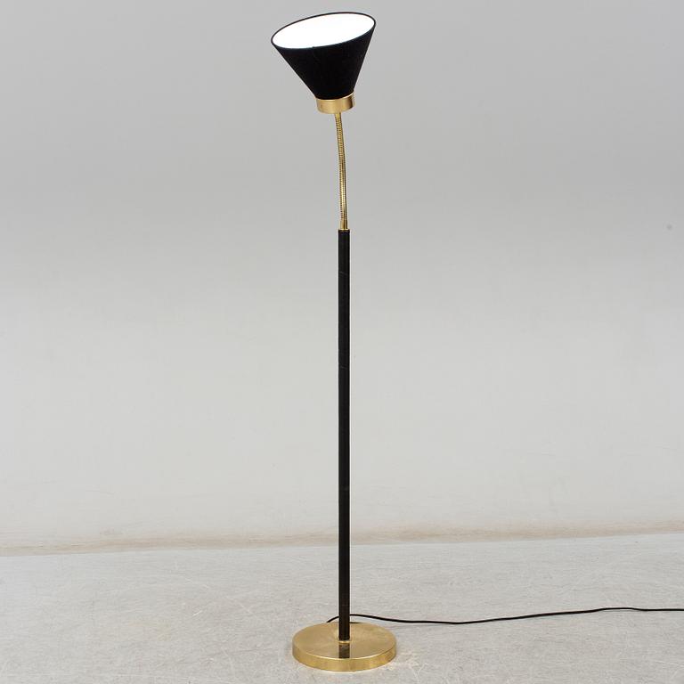 JOSEF FRANK, a brass and leather wrapped floor lamp, model 1838, from Firma Svenskt Tenn.