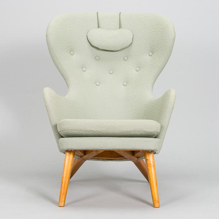 Carl Gustaf Hiort af Ornäs, A mid-20th-century armchair 'Siesta' manufacturer Puunveisto Oy - Träsnideri Ab, Finland.