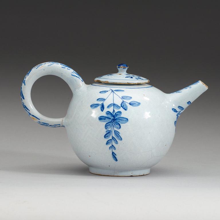 A Swedish Rörstrand faience teapot with cover, 18th Century.