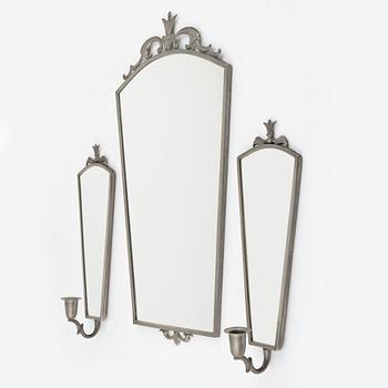 A Swedish Grace mirror and a pair of wall sconces, 1920's/30's.