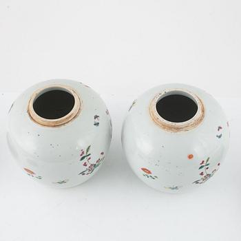A pair of Chinese famille rose jars, Qing dynasty,  19th century.
