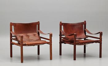 KARMSTOLAR, ett par, "Sirocco", design Arne Norell, 1900-talets tredje kvartal.