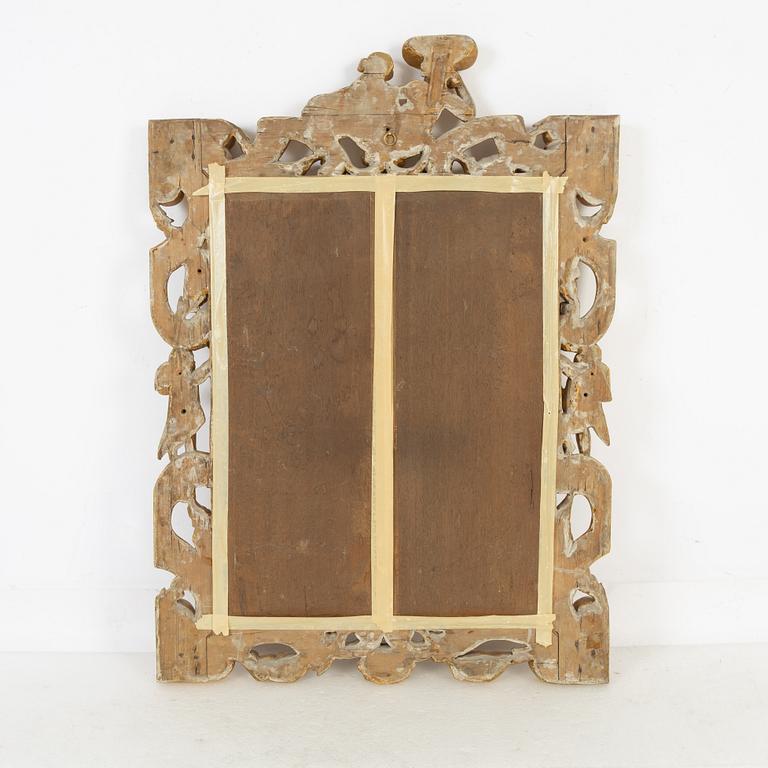 A gilt Baroque style mirror, circa 1900.