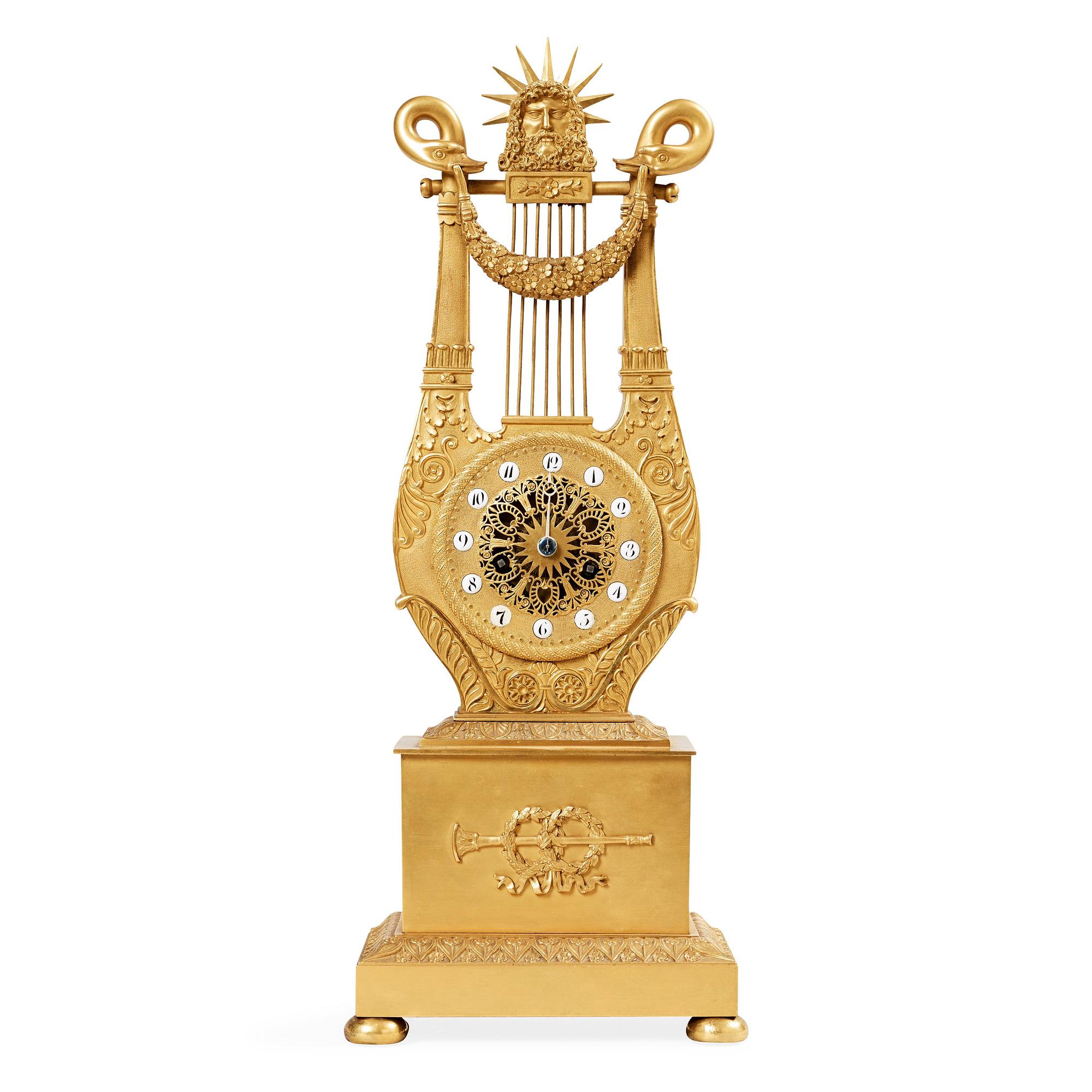 A French Empire early 19th century gilt bronze mantel clock.