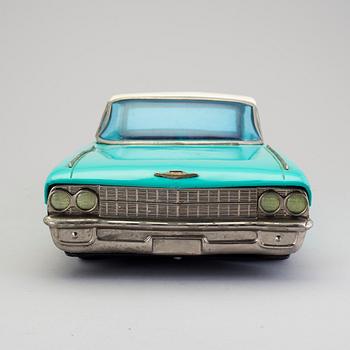 A tinplate Ichiko Cadillac Japan ca 1962.