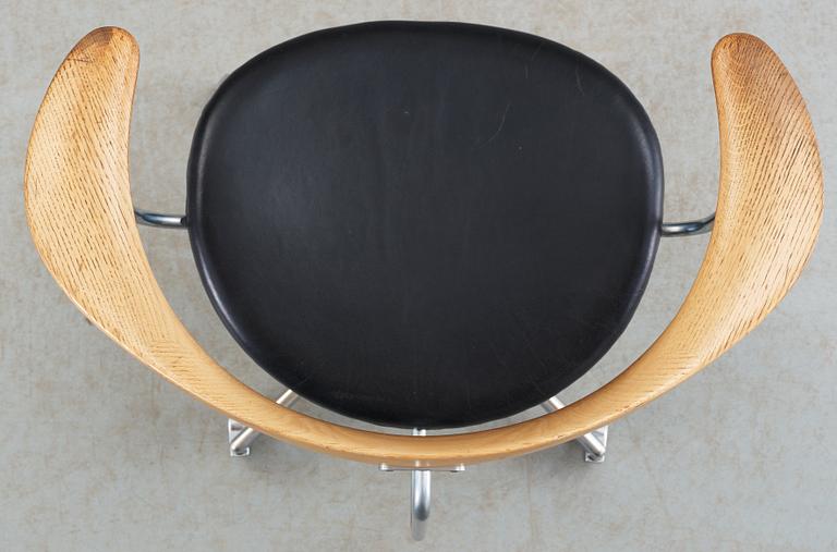 A Hans J Wegner 'Swivel chair', Johannes Hansen, Denmark circa 1960.