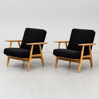 HANS J WEGNER, a pair of 'GE-240'/'Cigarren' oak easy chairs, Getama, Denmark.