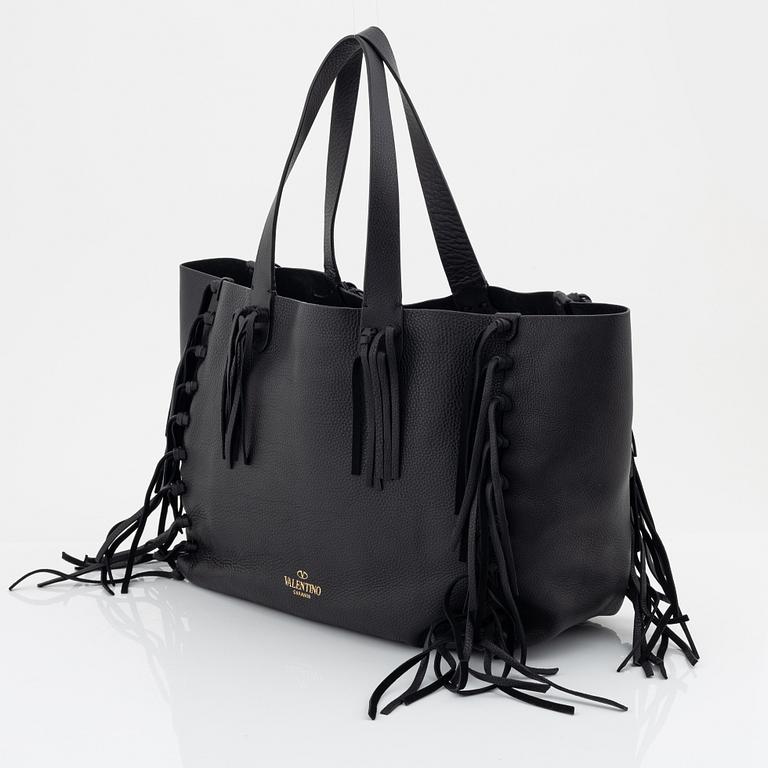 Valentino Garavani, a black leather fringe bag.