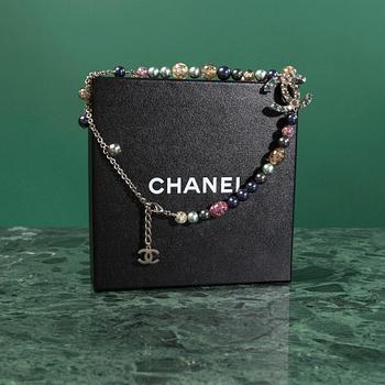 A necklace by Chanel.