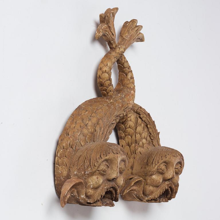 A pair of wooden beer dolphins, circa 1800.