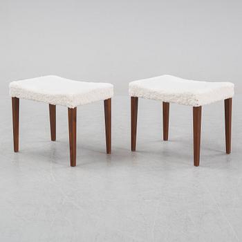 A pair of mahogany stools, mid 20th Century.