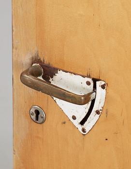 An Alvar Aalto borch plywood door, specifically for a patient's room of the Paimio Sanatorium, Finland ca 1932.