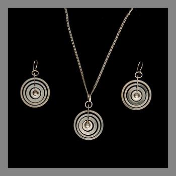 TAPIO WIRKKALA, PENDANT AND EARRINGS, Silver moon. Sterling silver, N. Westerback/Kultakeskus, 1970s.