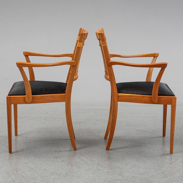 A pair of mahogany and rattan dining armchairs, Josef Frank, , model 1165, Svenskt Tenn, Stockholm.