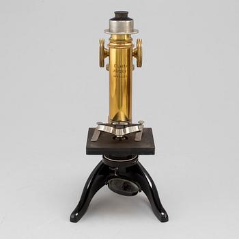 A microscope, marked Ernst Leitz, Wetzlar, No 85125.