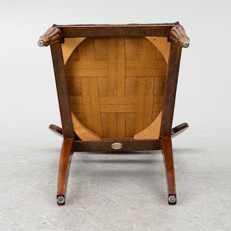 A set of 7 chairs, Empire style, W. Taylor & Sons, circa 1900.