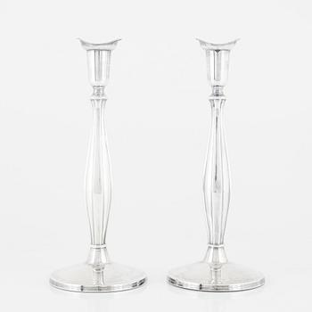 Tore Eldh, a pair of silver candlesticks, Ceson Guldvaru Ab, Gothenburg 1962.