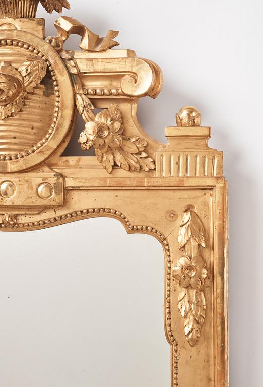 A Gustavian giltwood mirror, late 18th century.